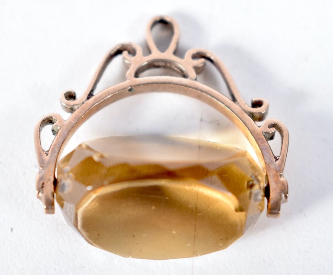 A Georgian 9 Carat Gold and Citrine Intaglio Fob Triple Spinner Seal - Un-engraved. Stamped 9CT, 2.: A Georgian 9 Carat Gold and Citrine Intaglio Fob Triple Spinner Seal - Un-engraved. Stamped 9CT, 2.5 cm x 2.5 cm x 1.3 cm, weight 6.1g