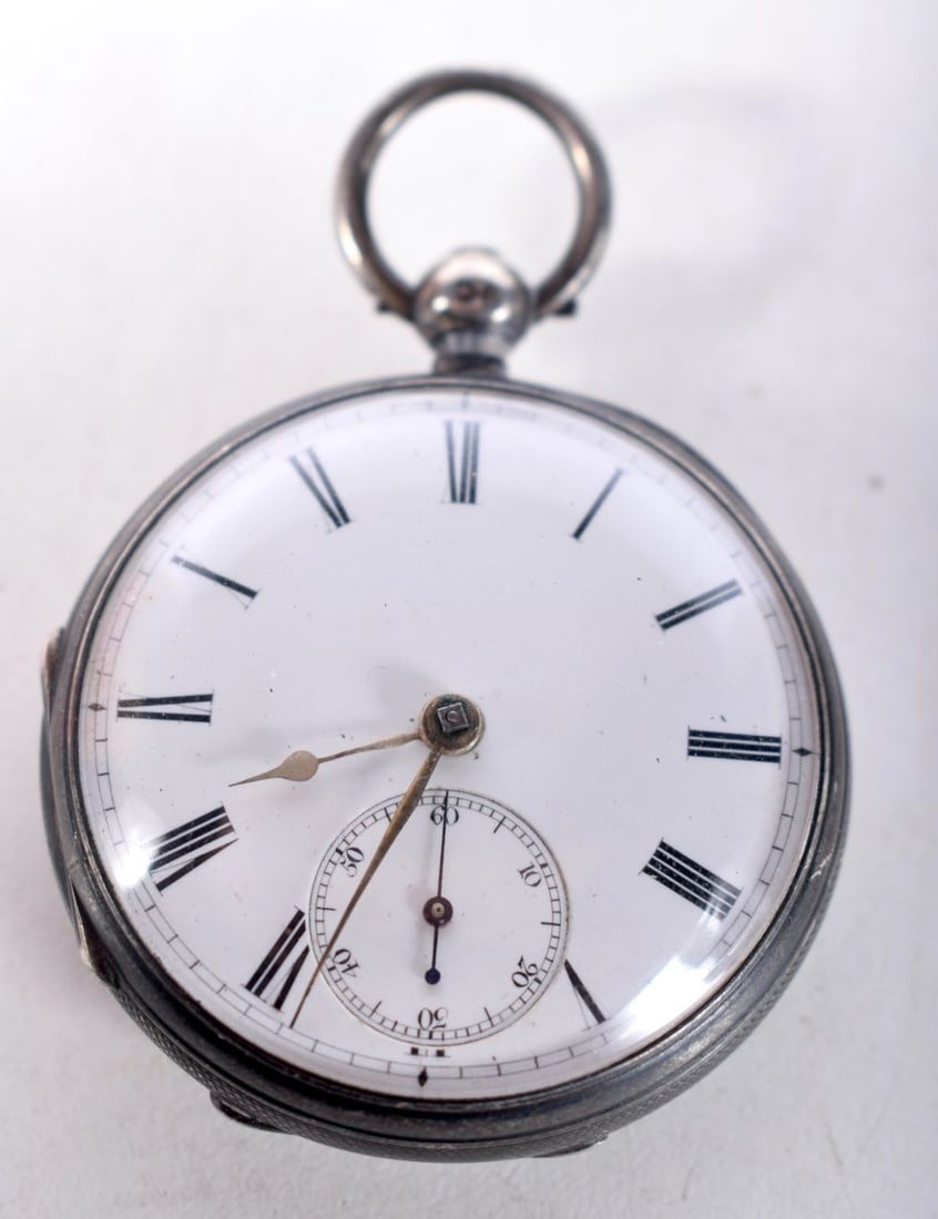 A Silver Cased Open Face Pocket Watch. Hallmarked London 1931.  4.6 cm diameter, Overwound, weight 9 (1 of 2)