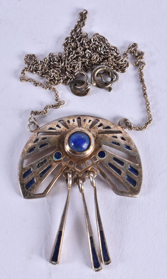 An Egyptian Revival Style Pendant Necklace.  Stamped 925.  Chain 46cm long, Pendant 3.6 cm x 2.8 cm, (1 of 2)