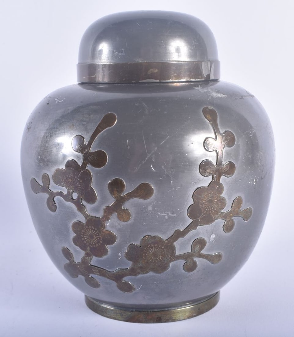 A LATE 19TH CENTURY CHINESE PEWTER TEA CADDY AND COVER decorated with foliage. 16 cm x 11cm. (1 of 4)