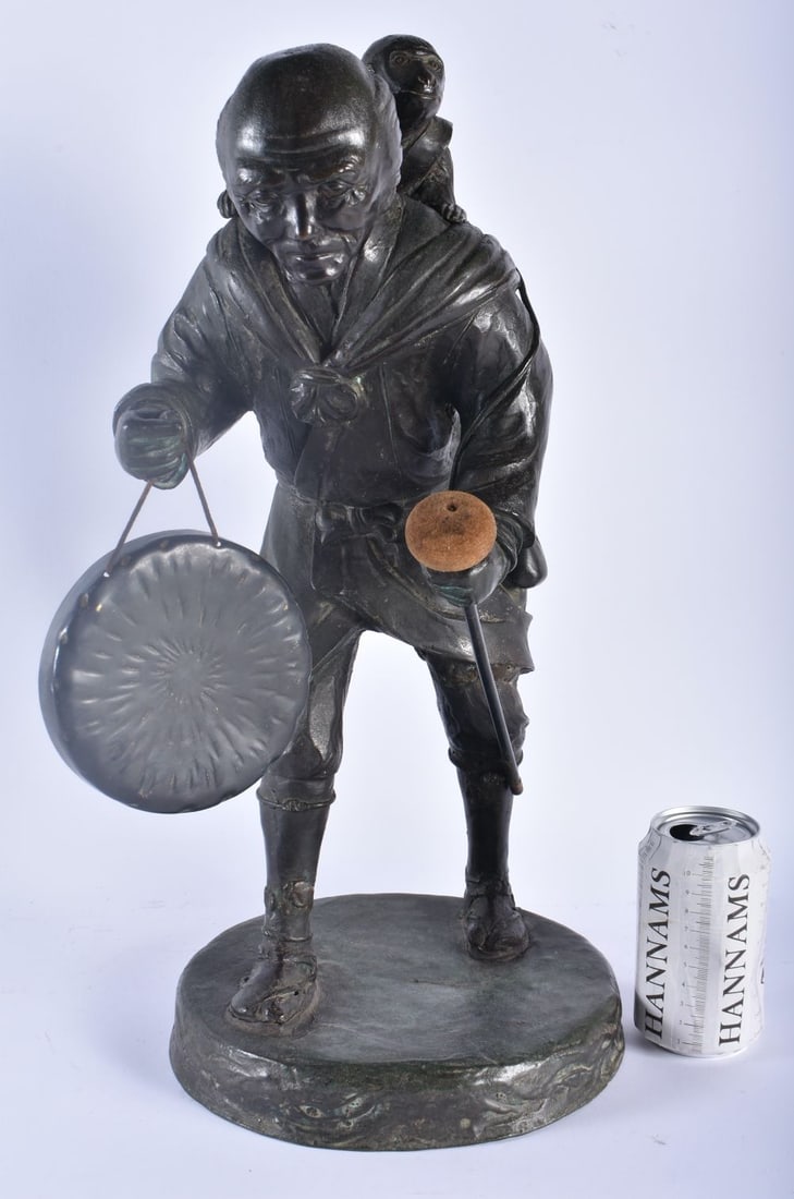 A LARGE 19TH CENTURY JAPANESE MEIJI PERIOD BRONZE OKIMONO DINNER GONG modelled as a male with a monk (1 of 6)