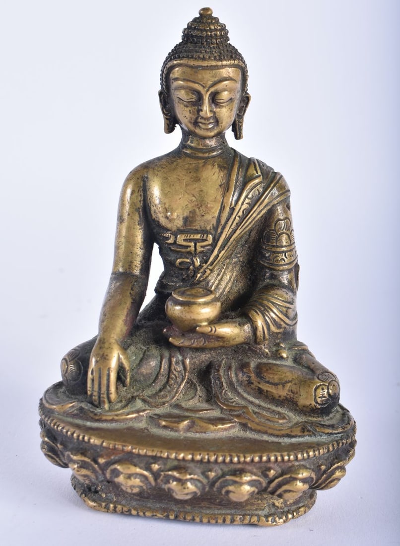 A 19TH CENTURY CHINESE BRONZE FIGURE OF A SEATED BUDDHA modelled upon a lotus capped base. 12 cm x 6: A 19TH CENTURY CHINESE BRONZE FIGURE OF A SEATED BUDDHA modelled upon a lotus capped base. 12 cm x 6 cm.