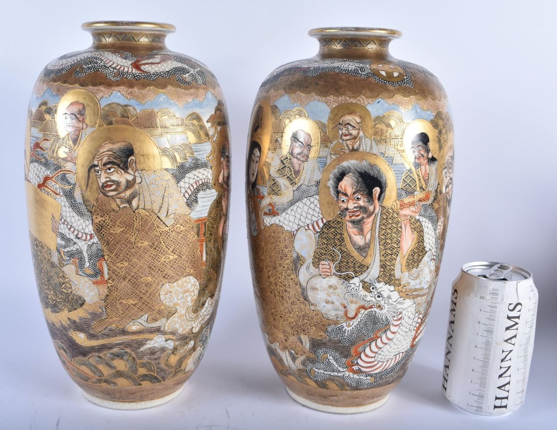A LARGE PAIR OF 19TH CENTURY JAPANESE MEIJI PERIOD SATSUMA VASES painted with immortals. 30cm x 14 c: A LARGE PAIR OF 19TH CENTURY JAPANESE MEIJI PERIOD SATSUMA VASES painted with immortals. 30cm x 14 cm.