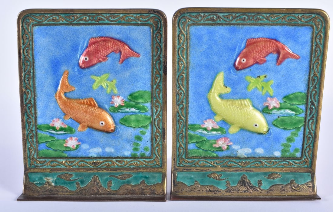A PAIR OF EARLY 20TH CENTURY CHINESE ENAMELLED FISH BOOKENDS Late Qing/Republic. Each 14 cm x 9 cm.: A PAIR OF EARLY 20TH CENTURY CHINESE ENAMELLED FISH BOOKENDS Late Qing/Republic. Each 14 cm x 9 cm.