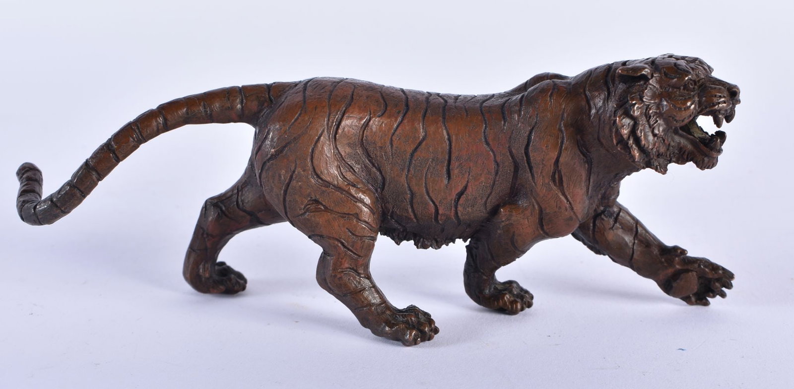 A JAPANESE BRONZE TIGER OKIMONO. 14 cm long.: A JAPANESE BRONZE TIGER OKIMONO. 14 cm long.