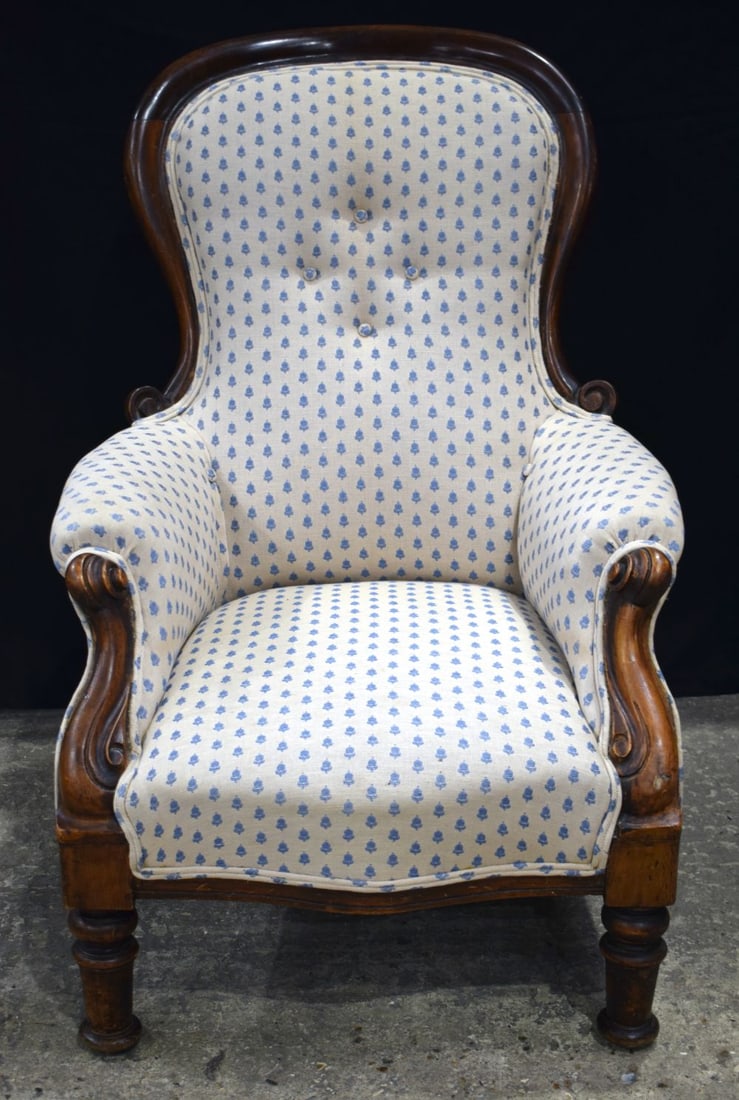 A Victorian upholstered armchair 98 x 69 x 53 cm.: A Victorian upholstered armchair 98 x 69 x 53 cm.