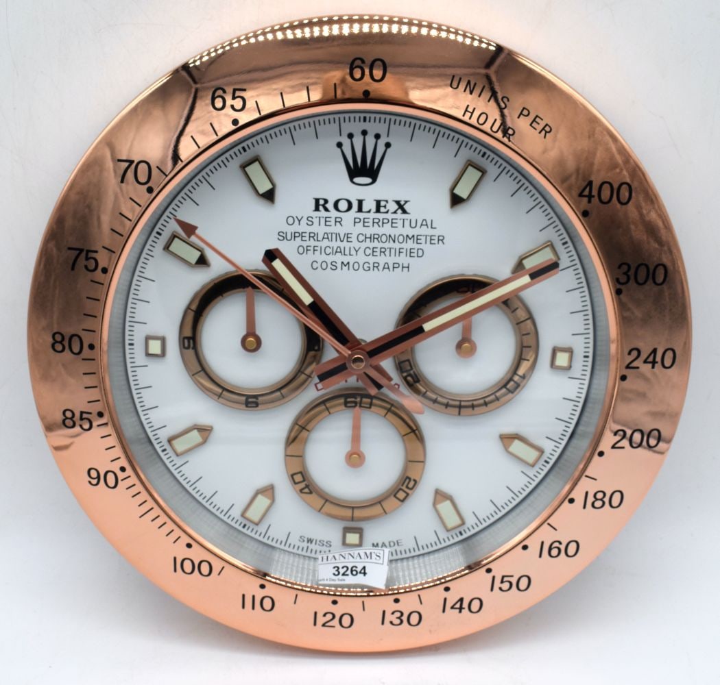 A Contemporary Rolex style dealership clock 33 cm.: A Contemporary Rolex style dealership clock 33 cm.