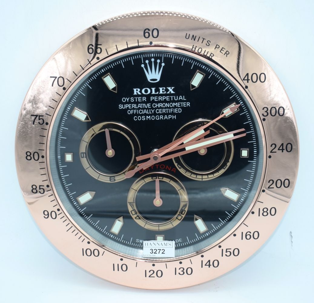 A Contemporary Rolex style dealership clock 33 cm.: A Contemporary Rolex style dealership clock 33 cm.
