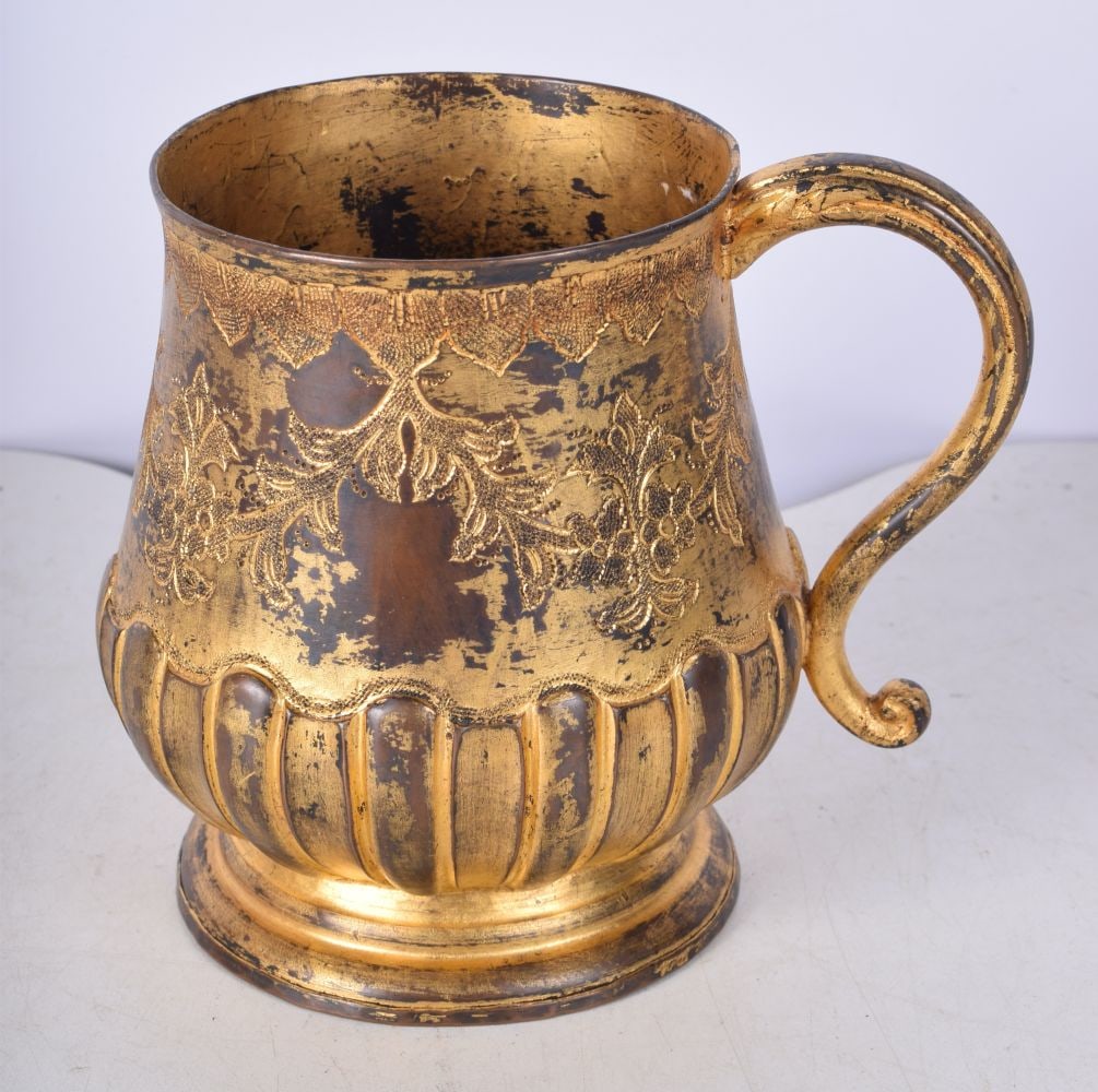 A bronze Ottoman Tombak with gilt decorated floral pattern 12 cm. (1 of 3)