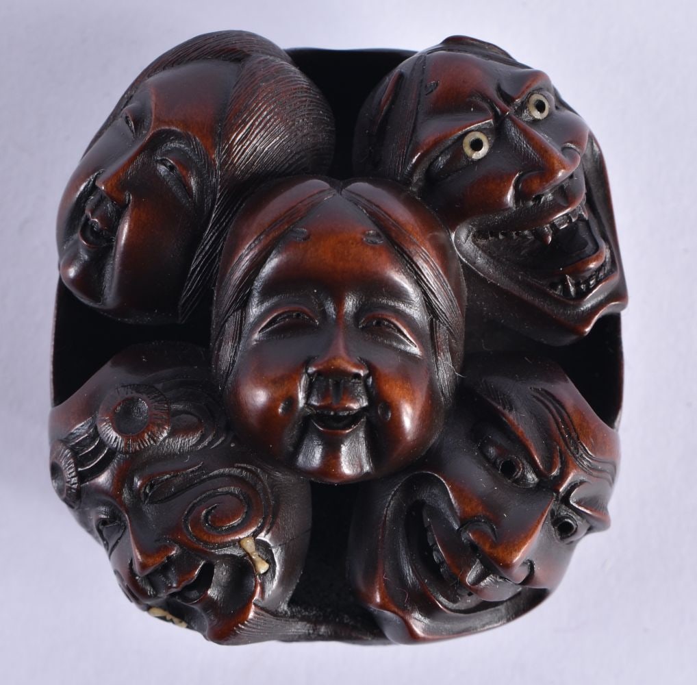 A 19TH CENTURY JAPANESE MEIJI PERIOD BOXWOOD NOH MASK NETSUKE finely carved, bearing old collection (1 of 4)