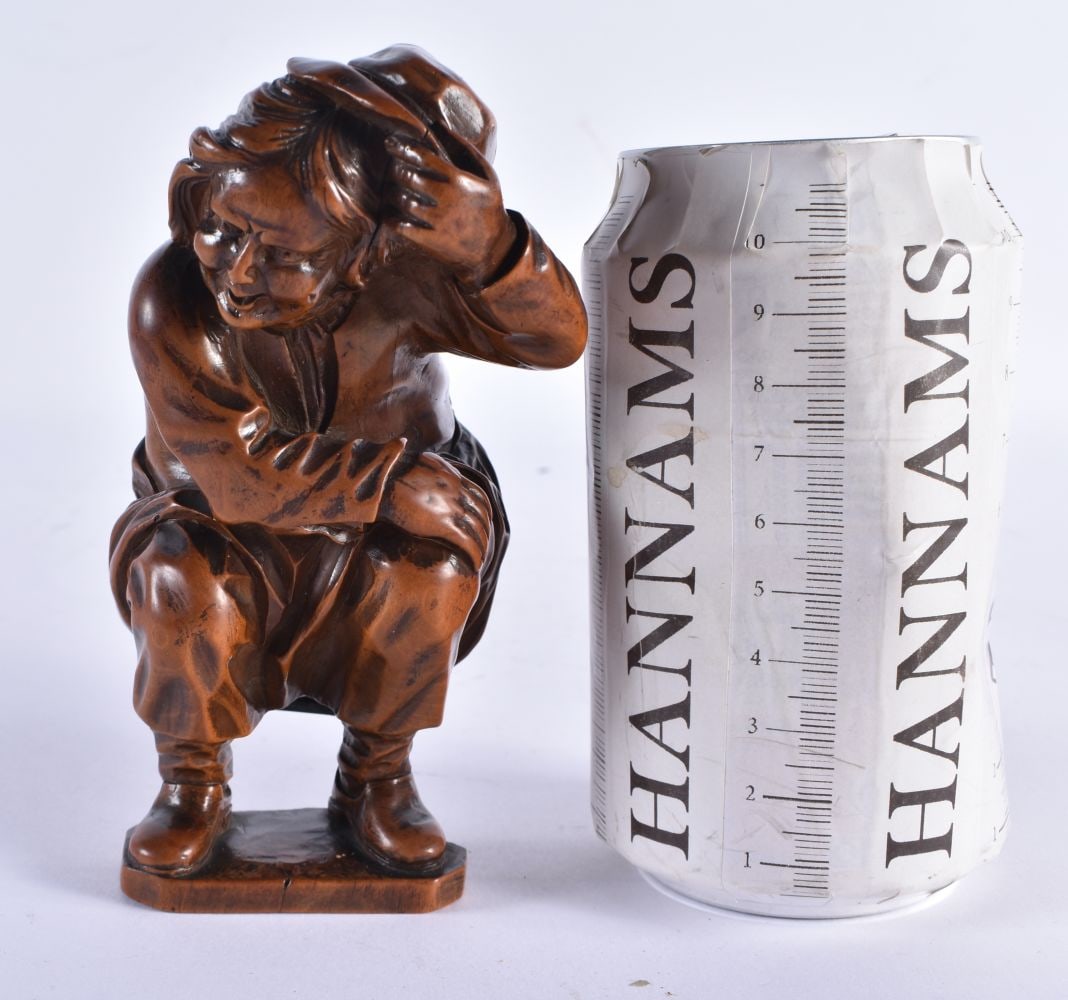 A VERY RARE 18TH CENTURY CARVED TREEN WOOD SNUFF BOX formed as a defecating male, wearing his buttoc (1 of 10)