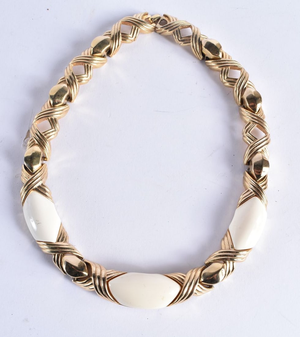Gold tone enamel collar necklace by designer Christian Dior. 151 grams. 45 cm long.: Gold tone enamel collar necklace by designer Christian Dior. 151 grams. 45 cm long.