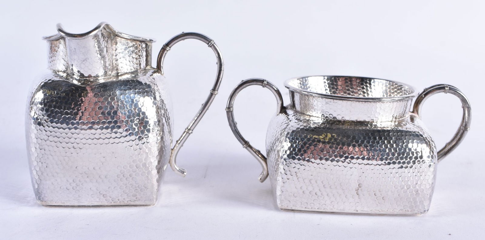 AN ANTIQUE JAPANESE SILVER CREAM JUG AND SUGAR BASIN. 188 grams. Largest 8.25 cm x 7.5 cm. (2) (1 of 6)