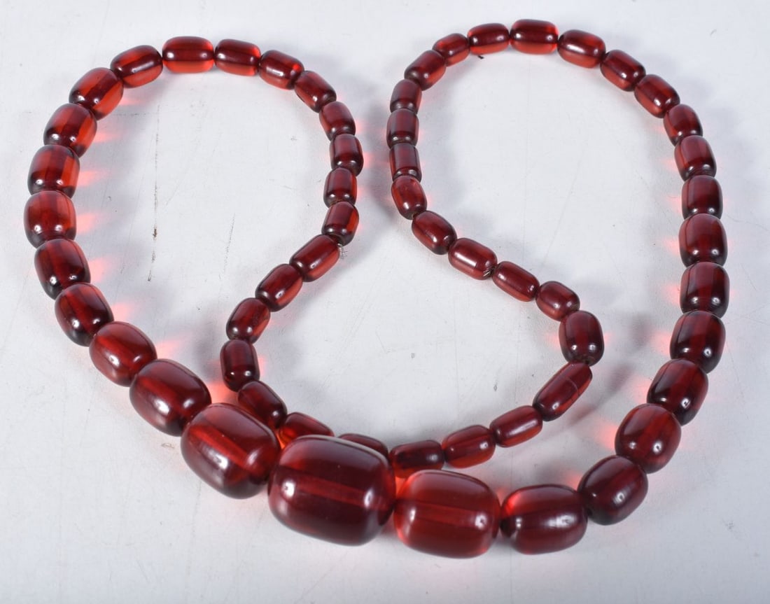 Cherry Bakelite graduated necklace. 88cm long, Largest Bead 22mm, weight 93g: Cherry Bakelite graduated necklace. 88cm long, Largest Bead 22mm, weight 93g