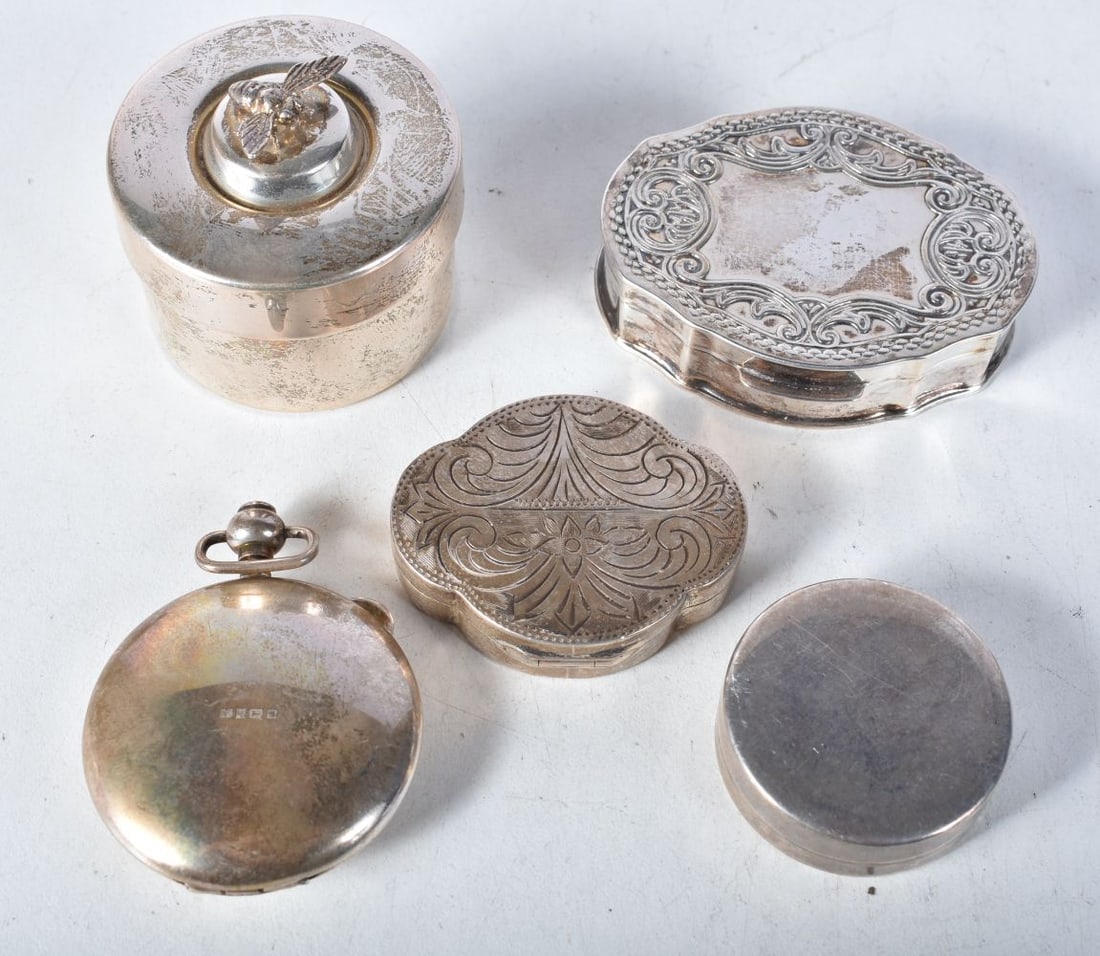 Five Silver Pill Boxes. Various marks incl Sheffield 2009 and 2003. Largest 4cm x 4.5cm. Total we: Five Silver Pill Boxes. Various marks incl Sheffield 2009 and 2003. Largest 4cm x 4.5cm. Total weight 147g (5)