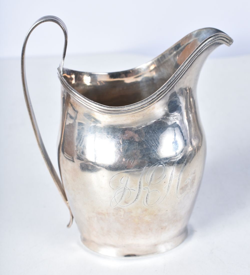 A Georgian Silver Helmet Cream Jug.  Hallmarked London 1802.  11.3cm x 9.8cm x 6.5cm, weight 94g (1 of 4)