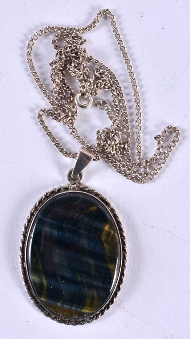 A Silver Tigers Eye Pendant Necklace. Chain 60cm, Pendant 4.4cm x 3.3cm, weight 21.2g: A Silver Tigers Eye Pendant Necklace. Chain 60cm, Pendant 4.4cm x 3.3cm, weight 21.2g