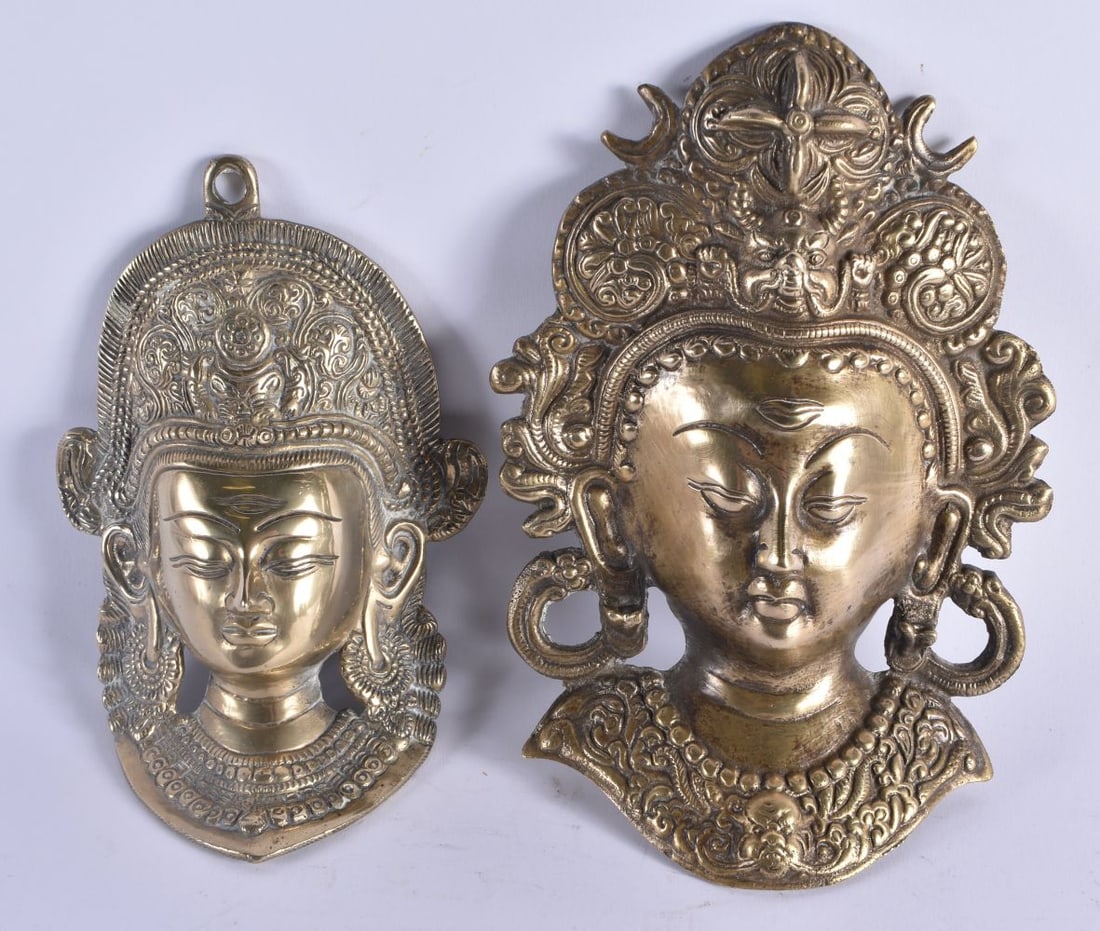 TWO LATE 19TH CENTURY INDIAN BRONZE WALL HANGING DEITY MASKS. Largest 22cm x 15 cm. (2) (1 of 4)