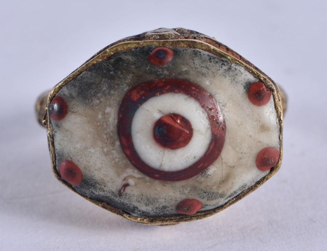 A MIDDLE EASTERN ISLAMIC YELLOW METAL RING. R. 14.6 grams. (1 of 3)