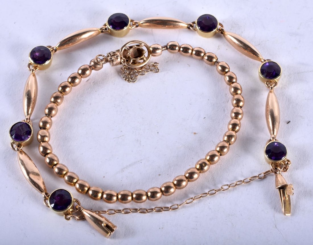 A 9CT GOLD BRACELET together with a 15ct gold and amethyst bracelet. 9ct gold 6.6 grams, 15ct gold 9 (1 of 2)