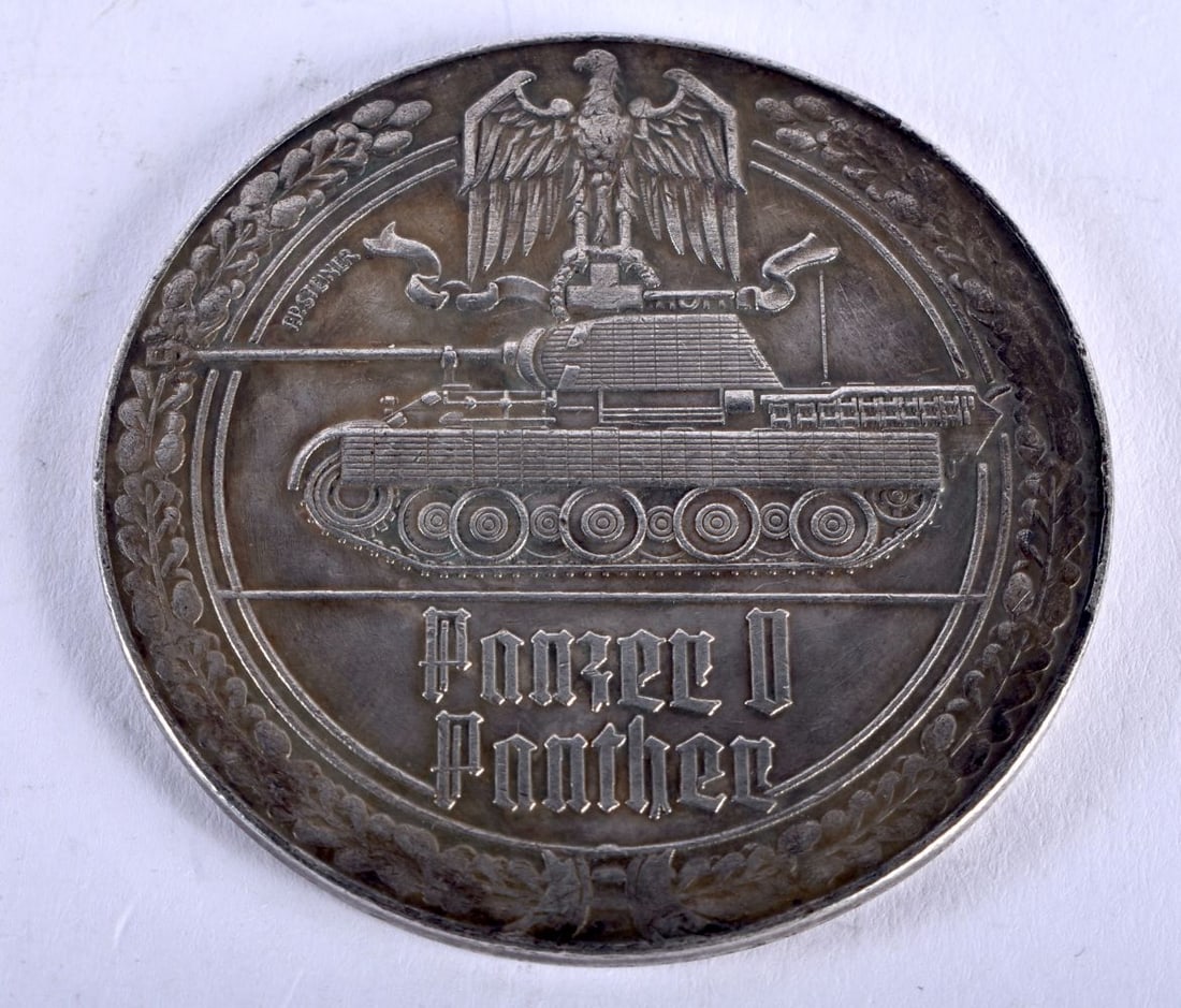 A GERMAN WWII MEDALLION. 38 grams. 5 cm diameter. (1 of 2)