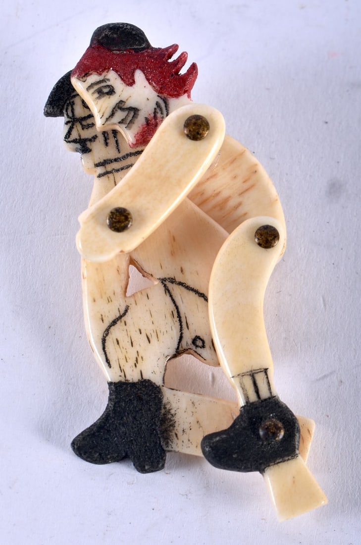 An Erotic Bone Carving of Two Males performing a Sex Act. 6.2cm x 2.6cm: An Erotic Bone Carving of Two Males performing a Sex Act. 6.2cm x 2.6cm