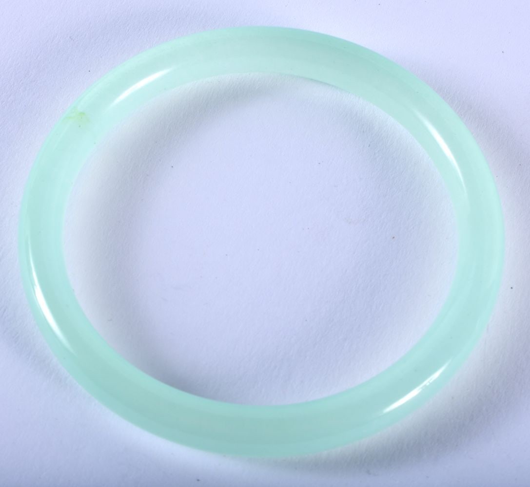 An Icy Jade Bangle. 6.2cm Internal Diameter, weight 27.9g: An Icy Jade Bangle. 6.2cm Internal Diameter, weight 27.9g