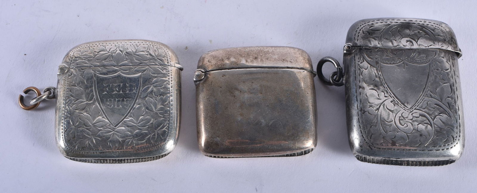 Three Silver Vesta Cases with Birmingham Hallmarks for 1900 and 1908. Largest 5.3cm x 3.8cm x 1.1cm, (1 of 6)