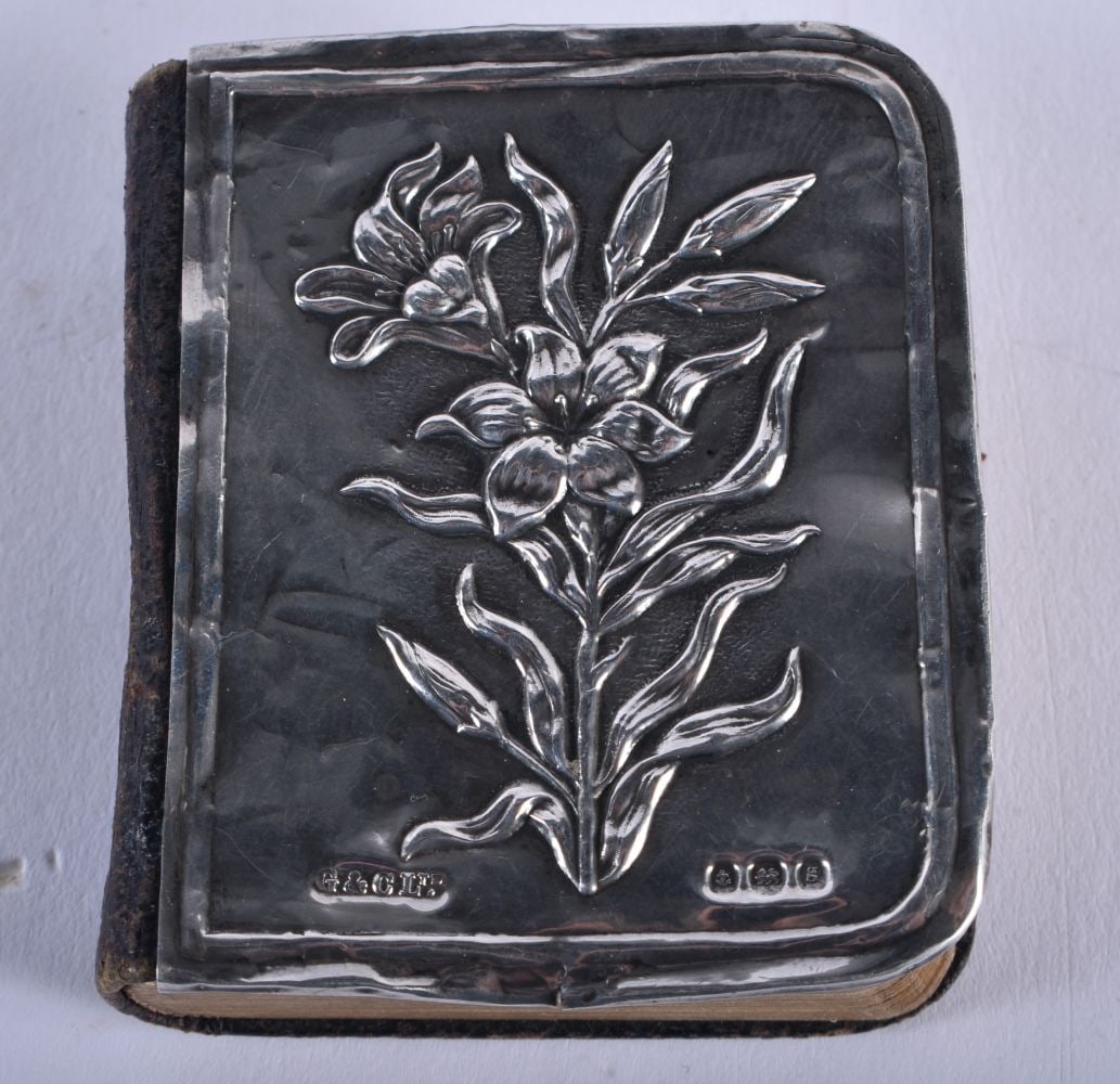A Common Prayer Book with an Art Nouveau Silver decoration with floral decoration in the form of Lil (1 of 3)