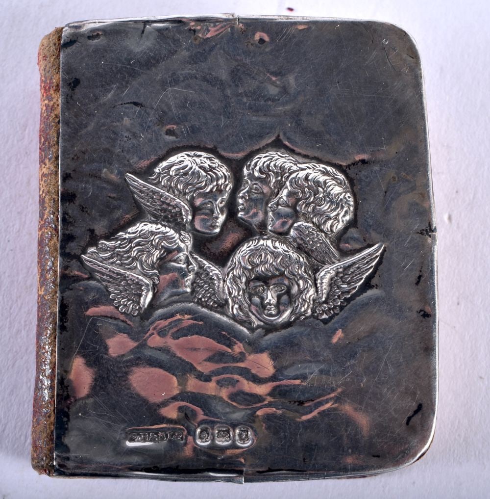 An Edwardian Common Prayer Book with Silver Mounts. Hallmarked Birmingham 1905. 5.6cm x 4.7cm x 1.4c: An Edwardian Common Prayer Book with Silver Mounts. Hallmarked Birmingham 1905. 5.6cm x 4.7cm x 1.4cm, weight 26g