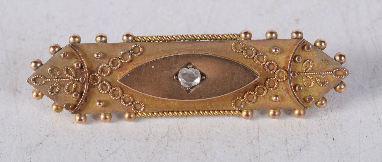 A 9CT GOLD BROOCH. 3 grams. 4.25cm x 1 cm. (1 of 3)