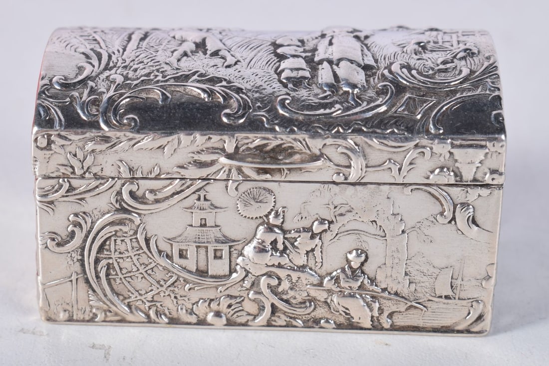 A Continental Miniature Silver Chest Embossed with Rural Scenes. Stamped 800. 3 cm x 5.4cm x 3.1cm, (1 of 4)