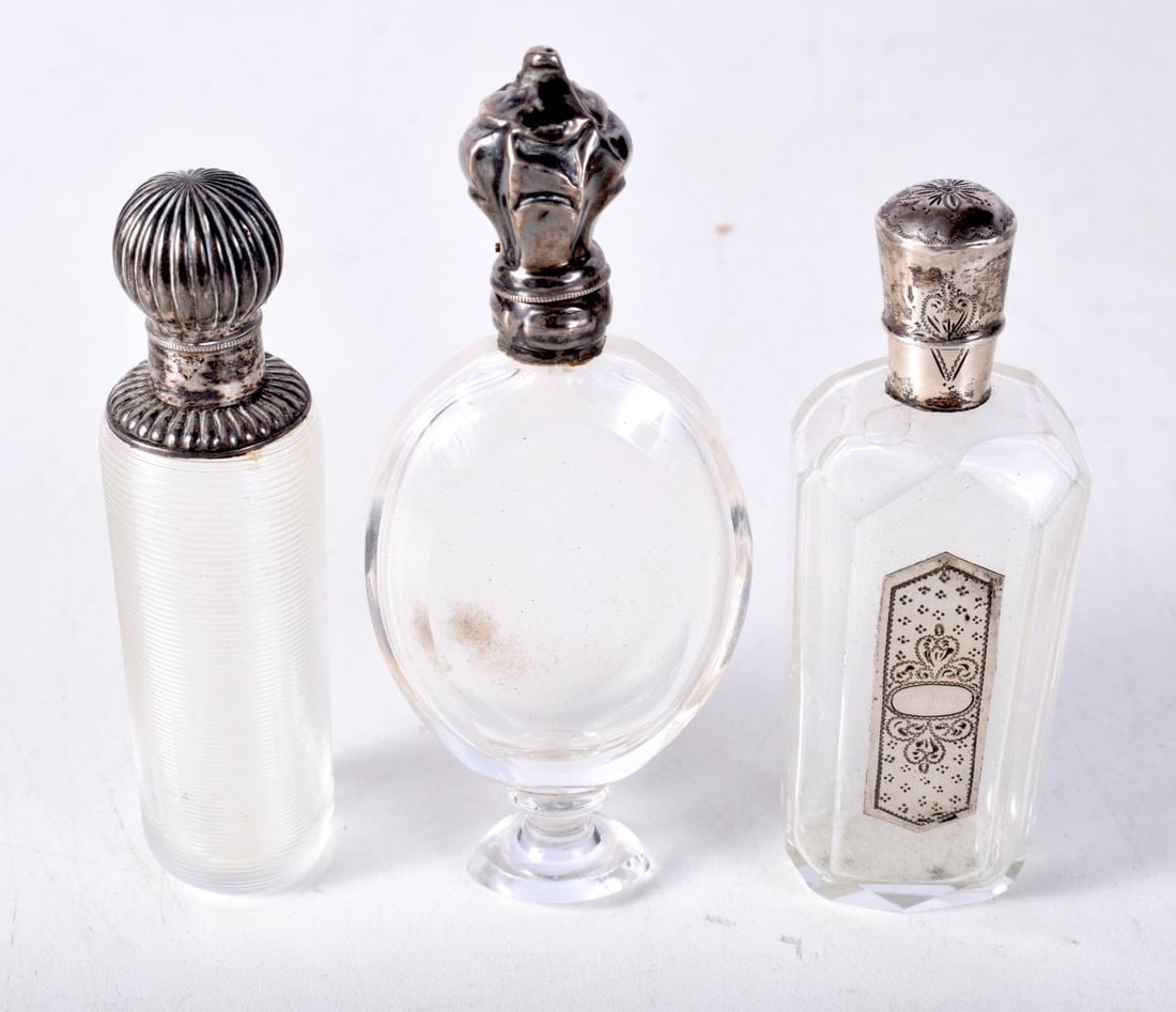 Three Glass Scent Bottles with Silver Tops. Stamped Sterling. Largest 10.5cm x 4.2cm x 1.6cm (3) (1 of 3)