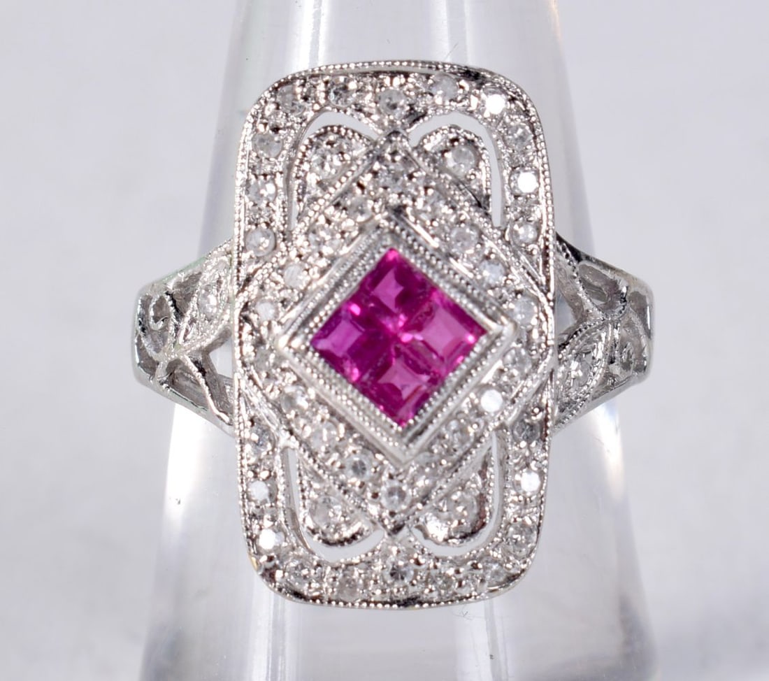 A 14CT GOLD DIAMOND AND RUBY RING. M. 5.1 grams. (1 of 3)