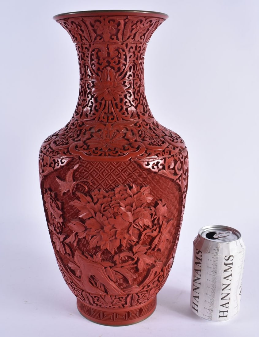 A LARGE CHINESE REPUBLICAN PERIOD CINNABAR LACQUER VASE decorated with foliage. 38 cm x 15 cm. (1 of 5)