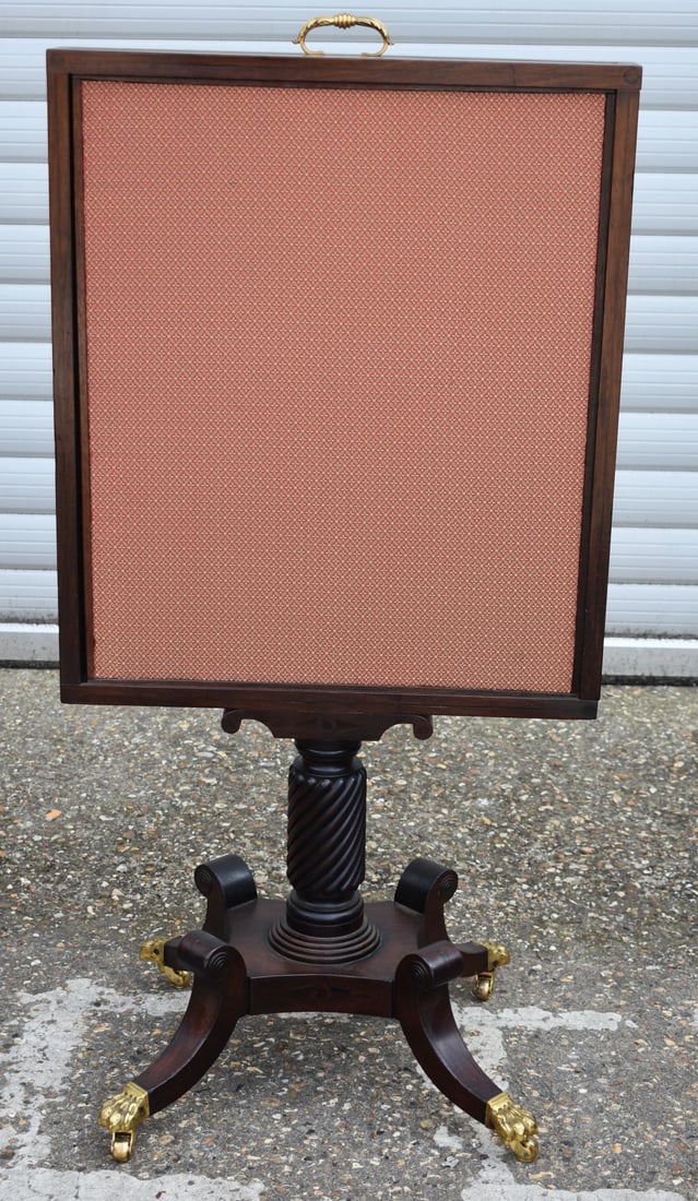 An antique wooden framed screen with retractable centre section 109 x 56 cm. (1 of 2)