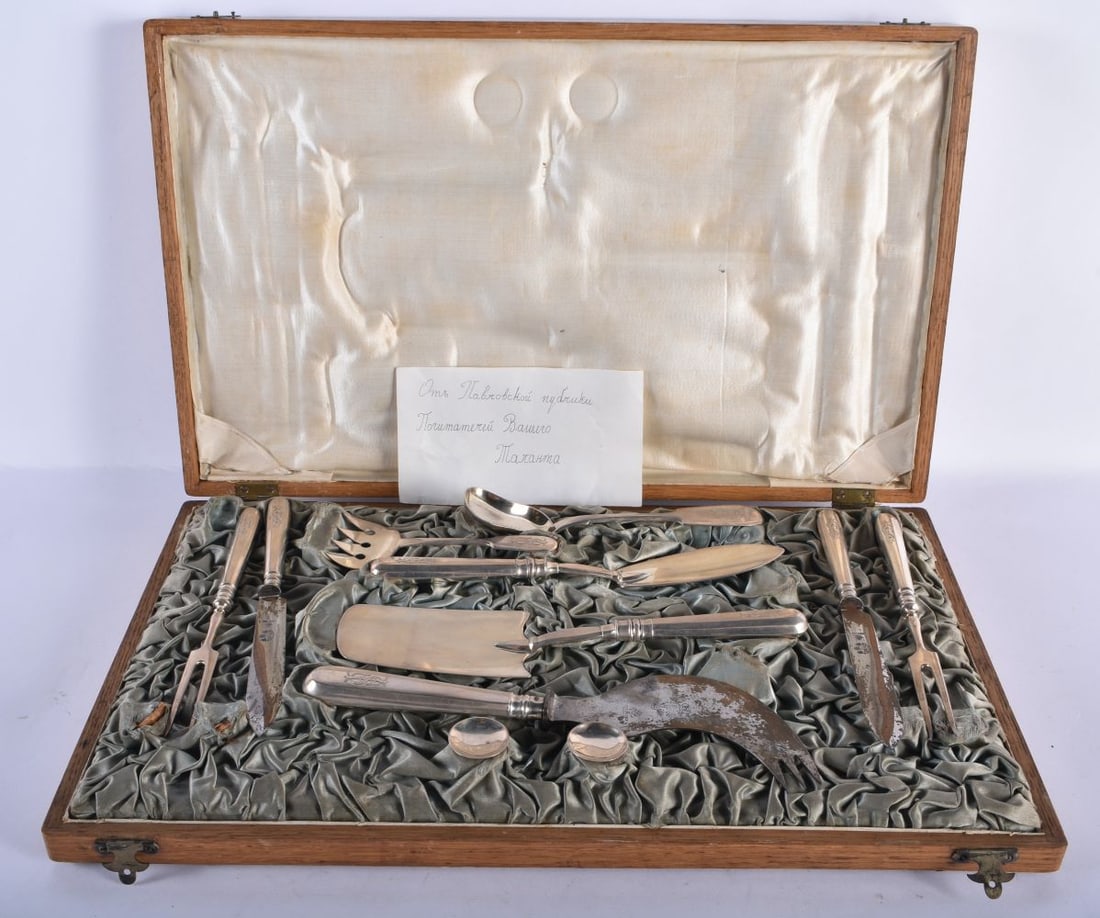 A LARGE ANTIQUE RUSSIAN SILVER CAVIAR SERVING SET each piece bearing a monogram, contained within or (1 of 13)