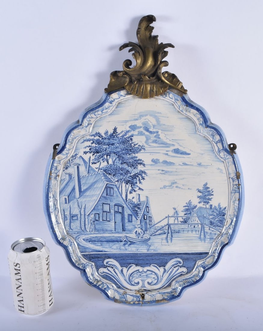 A LARGE 18TH/19TH CENTURY DELFT BLUE AND WHITE WALL PLAQUE with acanthus capped bronze mounts, paint (1 of 4)