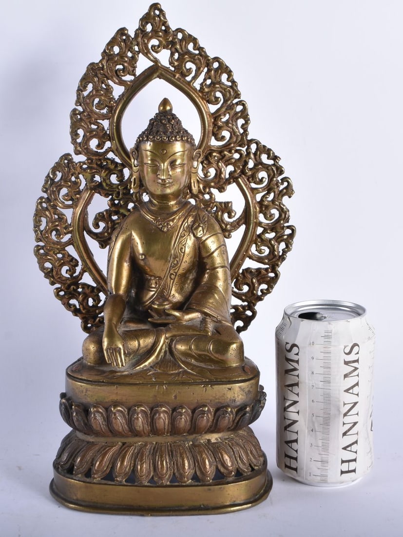 A LARGE 19TH CENTURY CHINESE TIBETAN BRONZE FIGURE OF A SEATED BUDDHA modelled upon a lotus capped b (1 of 8)