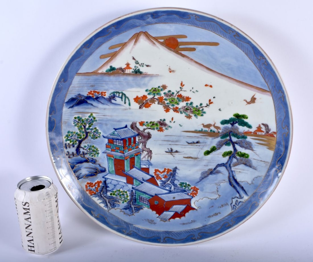 A LARGE 19TH CENTURY JAPANESE MEIJI PERIOD IMARI PORCELAIN CHARGER painted with a view of Mt Fuji. 3: A LARGE 19TH CENTURY JAPANESE MEIJI PERIOD IMARI PORCELAIN CHARGER painted with a view of Mt Fuji. 37 cm diameter.
