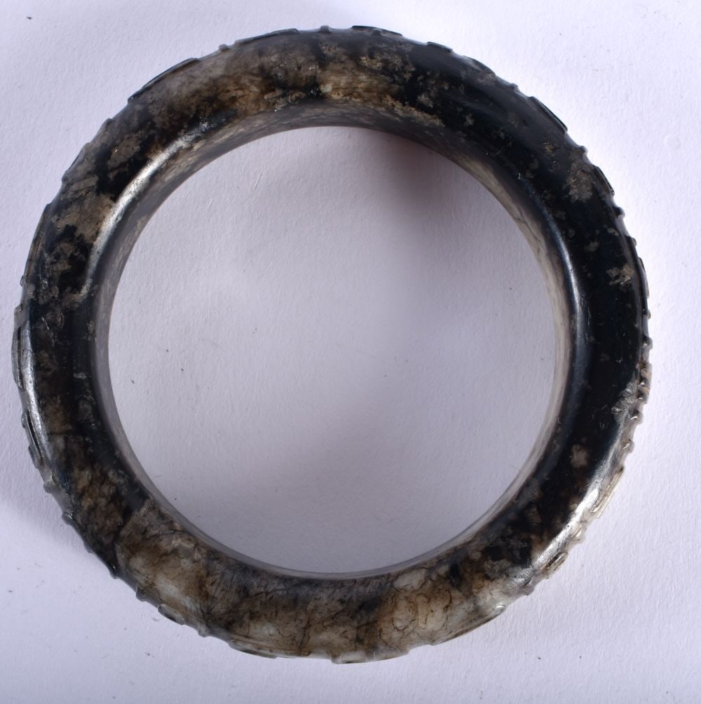 A 17TH/18TH CENTURY CHINESE CARVED MUTTON JADE BANGLE Ming/Qing. 8 cm diameter. (1 of 5)