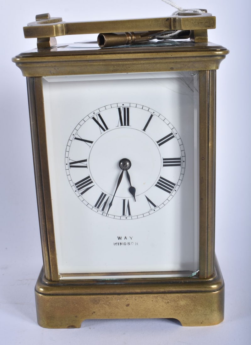 AN ANTIQUE BRASS CARRIAGE CLOCK. 18 cm high inc handle. Working (1 of 7)