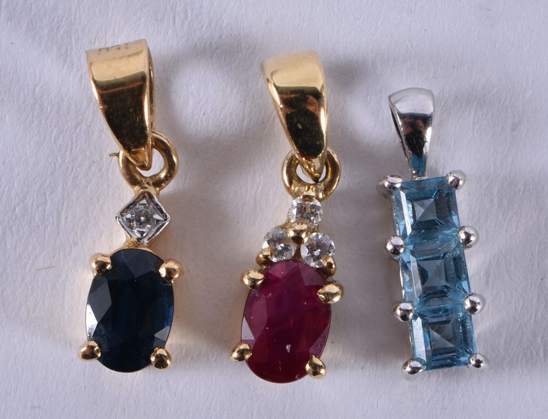 Three 9 Carat Gold Gem Set Pendants.  Stamped 9CT, largest 1.5cm x 0.4cm, total weight 2.8g (3) (1 of 2)