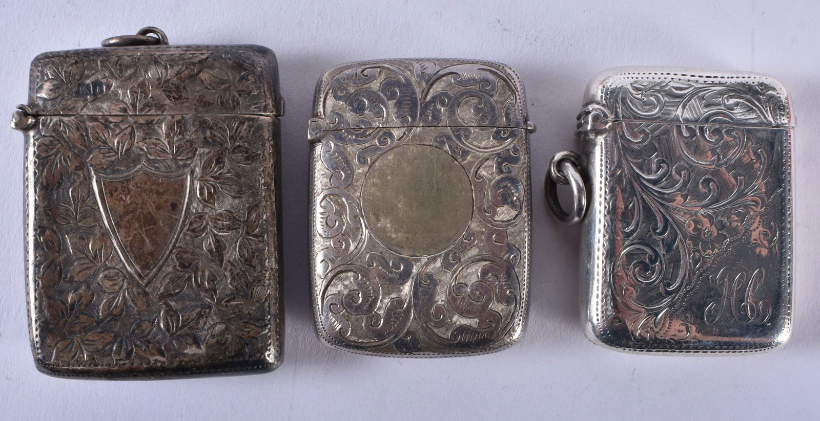 Three Early 20th Century Hallmarked Silver Vesta Cases.  Hallmarks include Chester 1905.  Largest 5. (1 of 7)