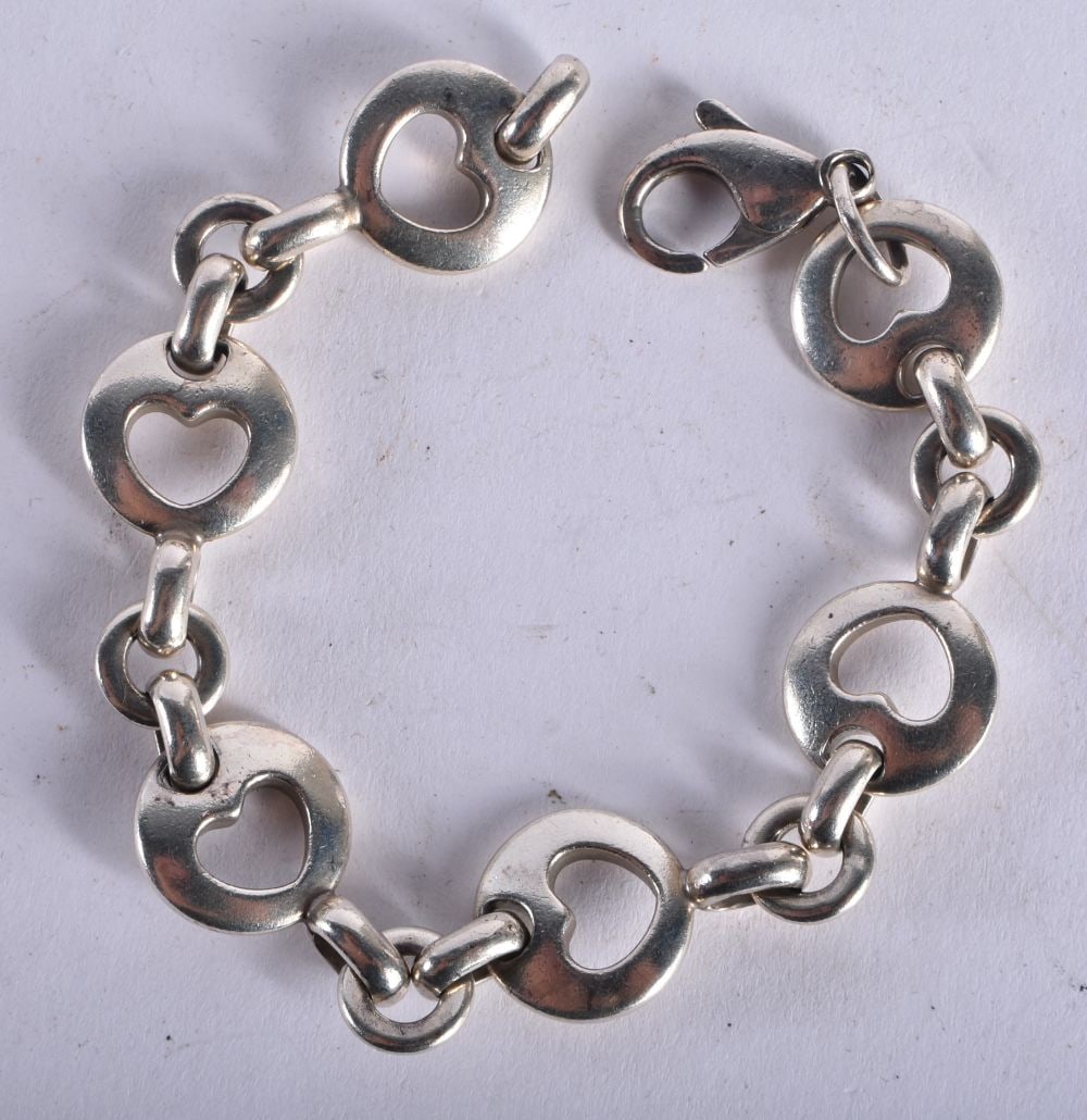 A Tiffany & Co Silver Heart Link Bracelet.  Stamped 925.  Length 18cm, weight 28.5g (1 of 4)