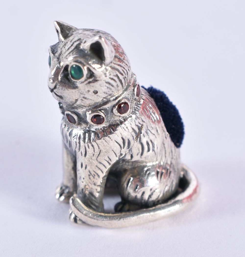 A Silver Seated Cat Pin Cushion.  Stamped 925 Sterling, 2.6 cm x 1.9cm x 1.6 cm, weight 13g (1 of 3)