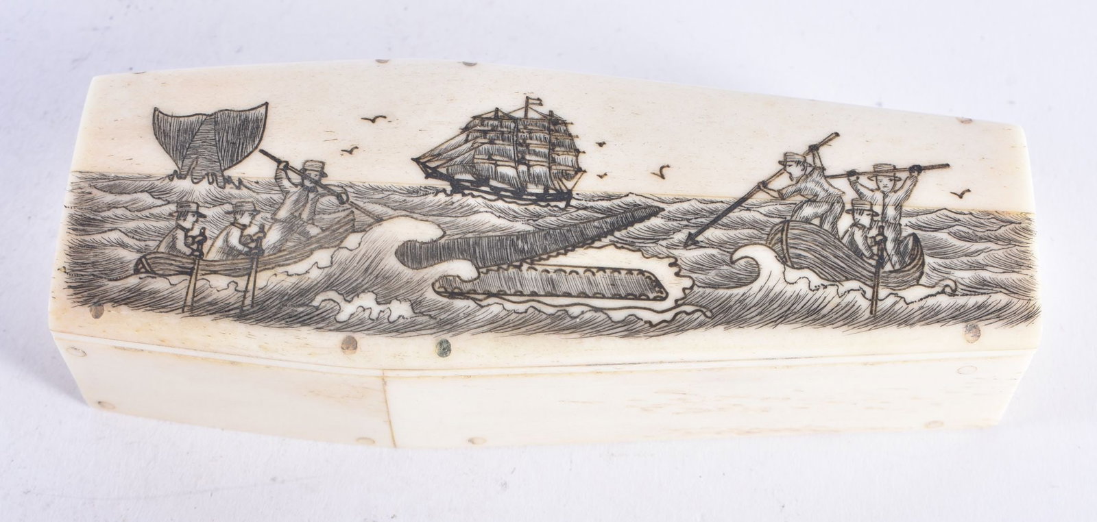 A CONTINENTAL BONE SCRIMSHAW COFFIN. 136.4 grams. 11.5cm x 4.25 cm.: A CONTINENTAL BONE SCRIMSHAW COFFIN. 136.4 grams. 11.5cm x 4.25 cm.