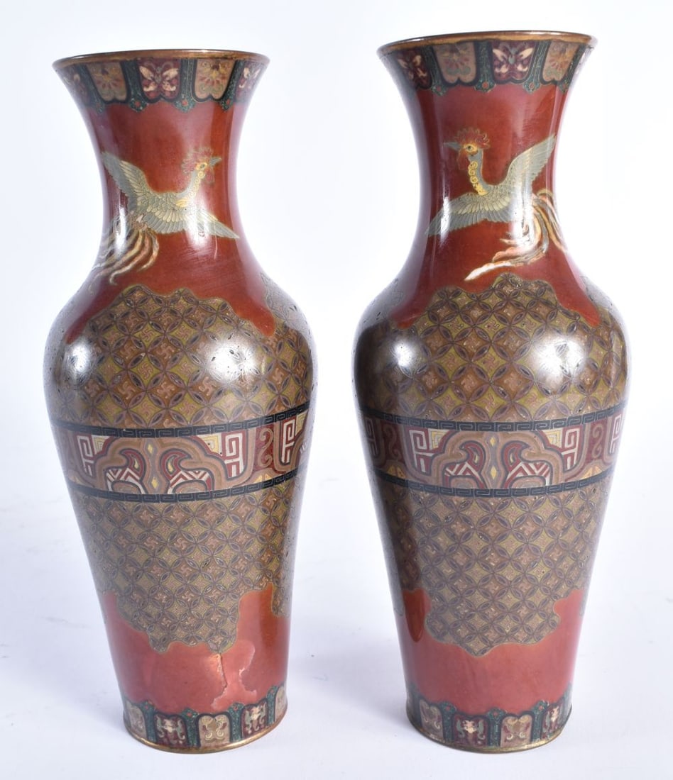 A PAIR OF 19TH CENTURY JAPANESE MEIJI PERIOD RED GROUND CLOISONNE ENAMEL VASES. 22cm high. (1 of 6)