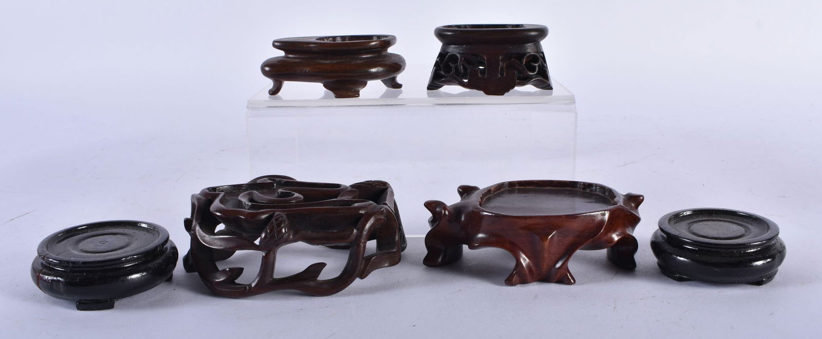 SIX SMALL CHINESE HARDWOOD STANDS. Largest 9 cm wide. (6) (1 of 9)