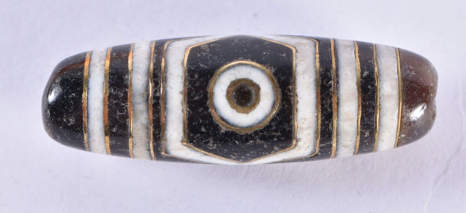 A TIBETAN GOLD INLAID AGATE ZHU BEAD. 8.6 grams. 4 cm x 1 cm. (1 of 3)